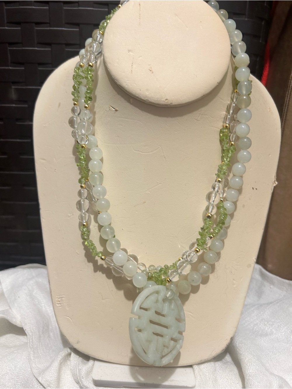 White Jade and Peridot Triple-Strand Necklace with Carved Jade Pendant